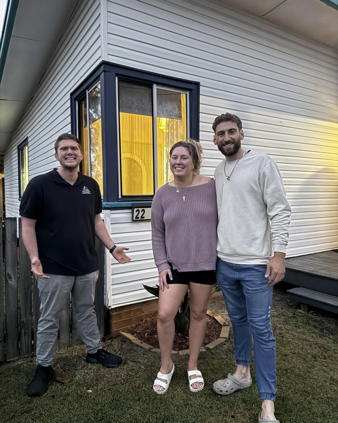 Jai with Tallisha and Phoenix outside their home